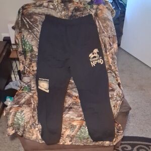 Nomad Black womens Joggers with Logo and Printed Patches